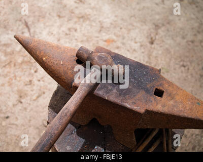 Anvil and hammer. Stock Photo