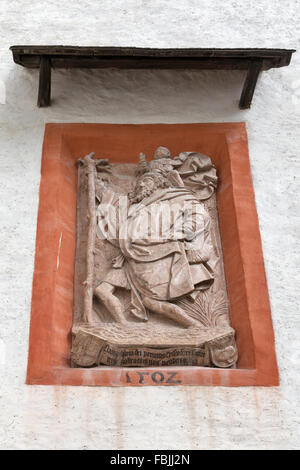 Ancient bas relief closeup on the wall of fortress Hohensalzburg in Salzburg, Austria. Stock Photo