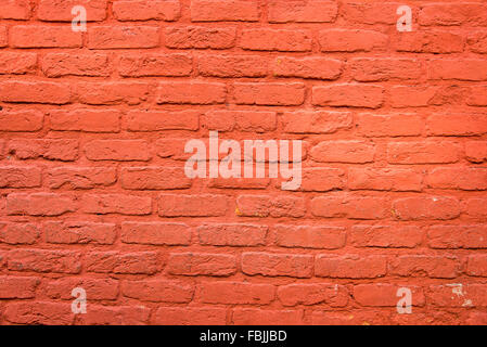 Background from a brickwall with red plaster Stock Photo