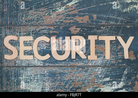 Word security written with wooden letters on rustic surface Stock Photo