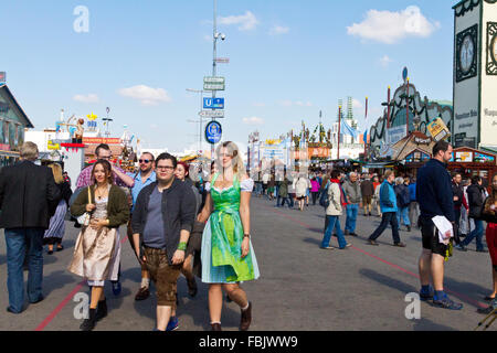 Young people in costume celebrating Oktoberfest in Munich, Germany. Stock Photo