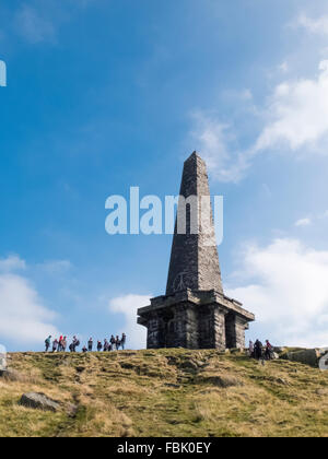 Walkers on Stoodley Pike , part of the Pennine way , Calderdale. Stock Photo