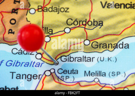 Close-up of a red pushpin in a map of Gibraltar. Stock Photo