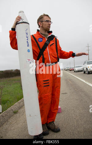 Lompoc, USA. 17th Jan, 2016. Former engineer of U.S. private spacecraft company SpaceX Kevin Meissner is seen with his self-made rocket model as he waits to watch the launch of Falcon 9 rocket near Vandenberg Air Force Base in California, the United States, on Jan. 17, 2016. U.S. private spacecraft company SpaceX launched on Sunday morning the Jason-3 ocean-measuring satellite, but failed in its attempt to land the spent first stage of its Falcon 9 rocket on a ship in the Ocean. Credit:  Yang Lei/Xinhua/Alamy Live News Stock Photo