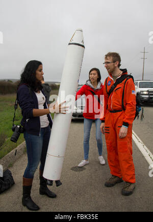 Lompoc, USA. 17th Jan, 2016. Former engineer of U.S. private spacecraft company SpaceX Kevin Meissner(1st R) is seen with his self-made rocket model as he waits to watch the launch of Falcon 9 rocket near Vandenberg Air Force Base in California, the United States, on Jan. 17, 2016. U.S. private spacecraft company SpaceX launched on Sunday morning the Jason-3 ocean-measuring satellite, but failed in its attempt to land the spent first stage of its Falcon 9 rocket on a ship in the Ocean. Credit:  Yang Lei/Xinhua/Alamy Live News Stock Photo
