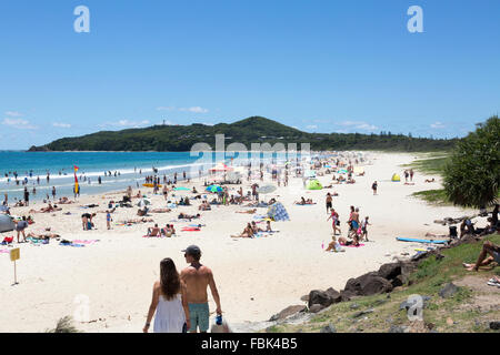 summer in Byron bay on New South Wales far north coast and a busy Main Beach,New South Wales,Australia Stock Photo