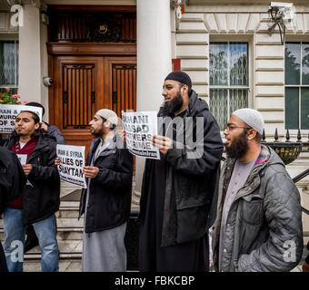 FILE IMAGES: London, UK. 18th Sept, 2013. File Images from 18-09-2013: Mohammed Reza Haque (2nd right), 35, known as the ‘Giant’ suspected to be the second British Islamic extremist thought to be among a team of executioners who shot dead five “spies” in Syria early this year. See here in 2013 at an Islamist protest opposite the Iranian Embassy in London Credit:  Guy Corbishley/Alamy Live News Stock Photo