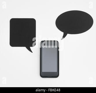 Smartphone and speech bubbles with copyspace Stock Photo
