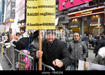 New York City, United States. 17th Jan, 2016. Emphasizing a point against US-Saudi collaboration in Times Square. Hundreds of Muslims gathered in Times Square to protest the Saudi government's execution of dissident sheikh Nimr Baqir al-Nimr and demand the release of sheikh Ibrahim Zakzaky. Credit:  Andy Katz/Pacific Press/Alamy Live News Stock Photo