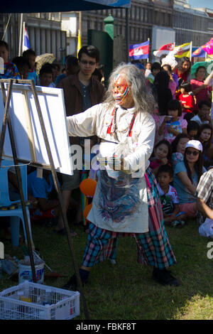 An artist paints dressed as a monkeys during the annual 'monkey buffet' in Lopburi province, some 150 kms north of Bangkok. More Stock Photo