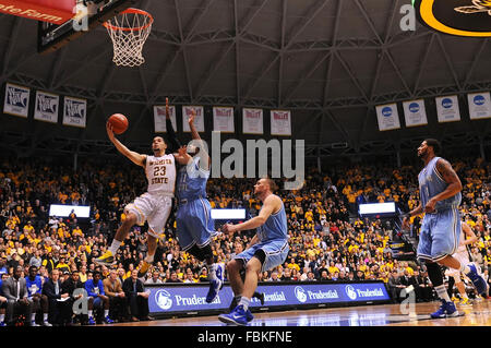 Wichita, Kansas, USA. 17th Jan, 2016. Wichita State Shockers guard Fred VanVleet (23) drives to the basket and is fouled by Indiana State Sycamores guard Devonte Brown (11) during the NCAA Basketball game between the Indiana State Sycamores and the Wichita State Shockers at Charles Koch Arena in Wichita, Kansas. Kendall Shaw/CSM/Alamy Live News Stock Photo