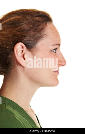 Profile view of young brunette woman from the side Stock Photo