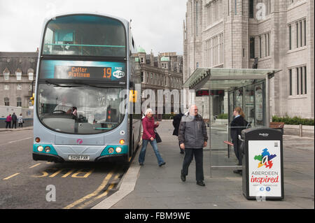 Bus at bus stop in Aberdeen city centre, outside Marischal College - Scotland, UK. Stock Photo