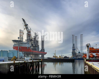Jack up rig with six legs in Esbjerg oil harbor, Denmark Stock Photo