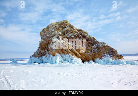 Island Edor (another names Belenkiy and Lion Head) in the Baikal lake pass Small Sea at winter time Stock Photo