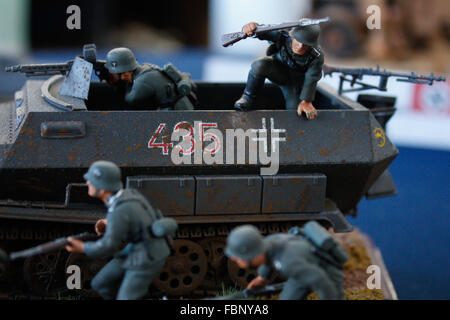 Torino, Italy. 17th Jan, 2016. A Nazis with armies preparing their selves during exhibition at Grugliasco, near Torino, a weekend dedicated to the static and dynamic modeling, with flight simulation, trains in motion, radio controlled cars and much more. © Cycle For Water Campaign/Alamy Live News Stock Photo