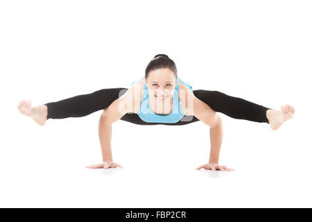 smiling sporty yogi girl doing fitness exercises handstand yoga asana fbp2cr