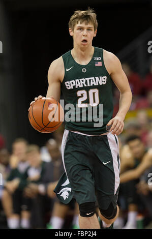 Matt McQuaid of the Michigan State Spartans dribbles up court during ...