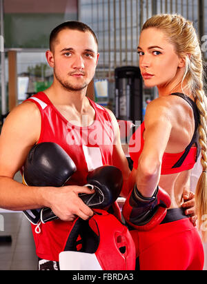 Female boxer with your male coach after workout. Stock Photo