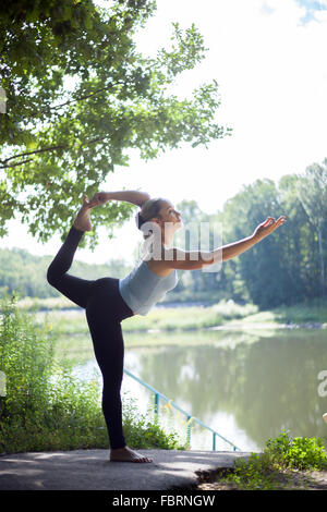 Female Instructor in Yoga Fallen Angel Pose Variation Stock Photo - Image  of variation, angel: 235366622