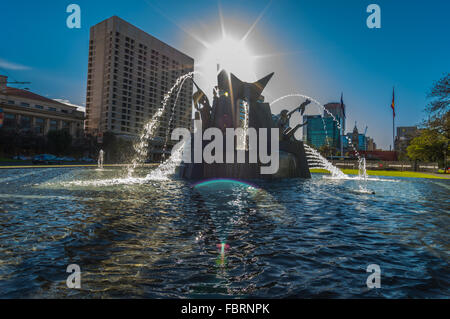 Adelaide's Victoria Square fountain blocks the sun. Stock Photo