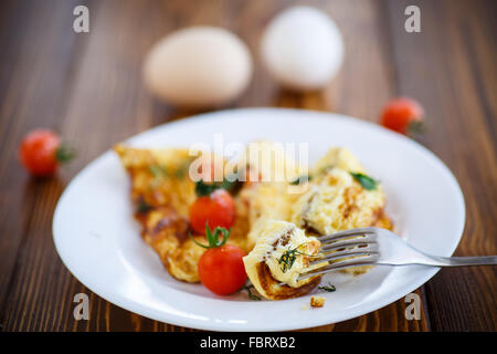 scrambled eggs with tomatoes Stock Photo