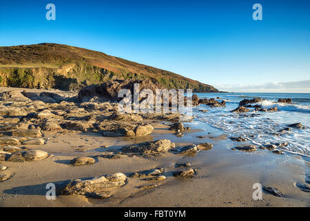 Low tide at Hemmick beach at Penare near Gorran Haven on the south coast of Cornwall Stock Photo