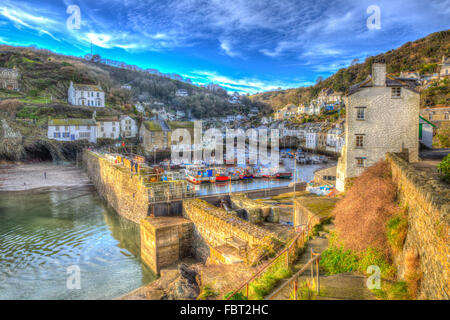 English south west coast fishing village Polperro Cornwall England with houses and harbour wall in HDR like painting Stock Photo