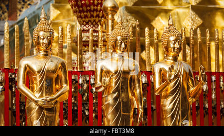 Gold Buddha statues in Wat Phra That Doi Suthep Stock Photo