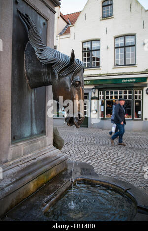 Horse head water fountain, Bruges Stock Photo