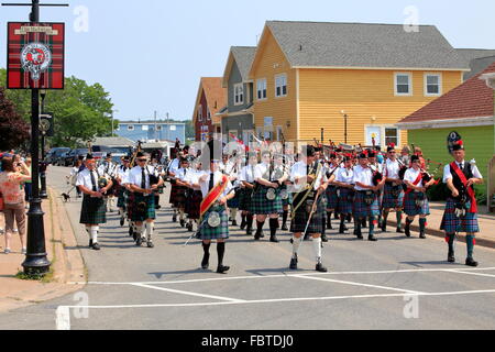 A Scottish pipe band marching in Pictou, Nova Scotia, Canada Stock Photo