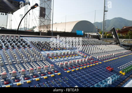 Big mixer console in a concert stage Stock Photo