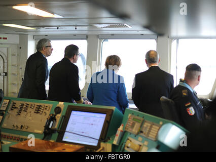 Kiel, Germany. 19th Jan, 2016. Kiel, Germany. 19th January, 2016. German Chancellor Angela Merkel (CDU) standing on the bridge of the corvette Braunschweig at the naval base in Kiel, Germany, 19 Janaury 2016. During her visit, Chancellor Merkel learned about the tasks and capabilities of the units of Einsatzflotille 1. PHOTO: LUKAS SCHULZE/DPA Credit:  dpa picture alliance/Alamy Live News Stock Photo