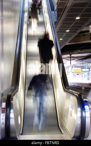 people on escalator Stock Photo