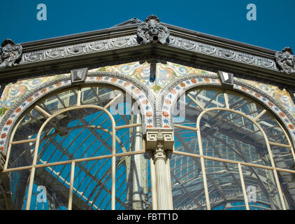 Glass old building facade with blue sky. detail Stock Photo