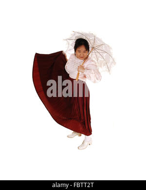 Girl playing with her skirt. Stock Photo