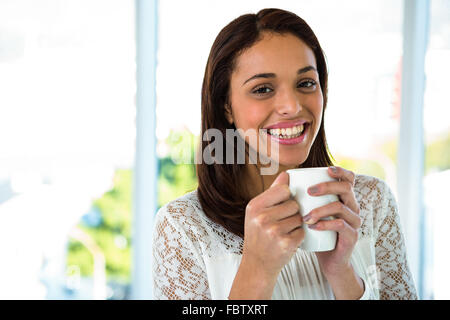 Young girl drink her tea Stock Photo