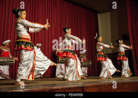 A group of Kandyan dancers performing the Pooja dance with the Kandyan drummers part of the Kandyan dance in Ksndy, Sri Lanka Stock Photo