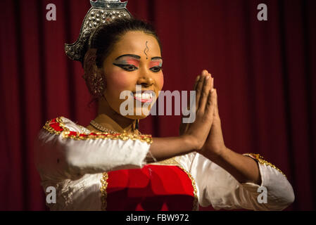 A group of Kandyan dancers performing the Pooja dance with the Kandyan drummers part of the Kandyan dance in Kandy, Sri Lanka Stock Photo
