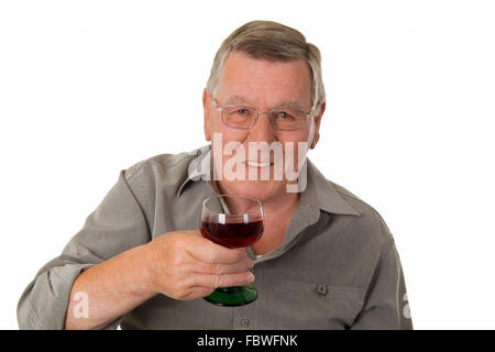 Old man drinking red wine Stock Photo