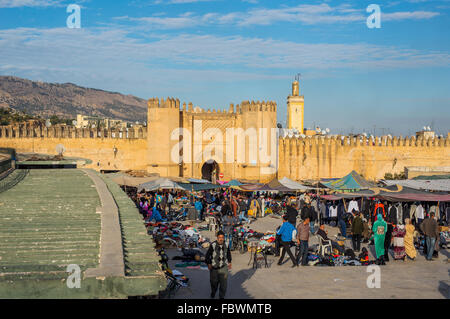 Market in Bab Chorfa at sunset, view from Bou Jeloud square. Bab Chorfa is a gate to ancient Fez El Bali Medina. Fez, Morocco. Stock Photo