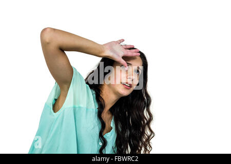 Worried woman covering her face with hand Stock Photo