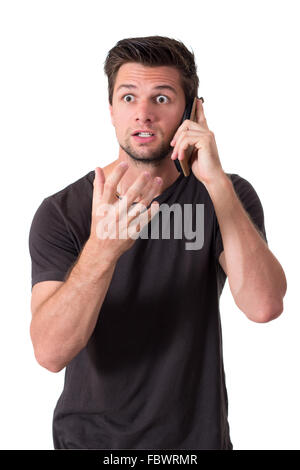 Young Man very angry talk on phone Stock Photo