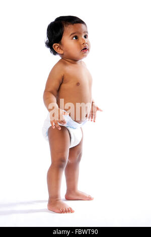 Cute baby toddler standing Stock Photo