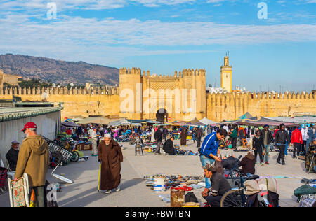 Market in Bab Chorfa at sunset, view from Bou Jeloud square. Bab Chorfa is a gate to ancient Fez El Bali Medina. Fez, Morocco. Stock Photo