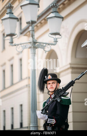 OSLO, NORWAY - JULY 31, 2014: Royal Guard guarding Royal Palace Stock Photo