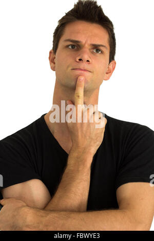 Man thinking with hand on face Stock Photo