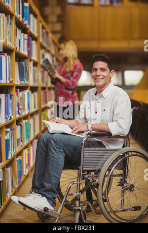 Student in wheelchair talking with classmate Stock Photo