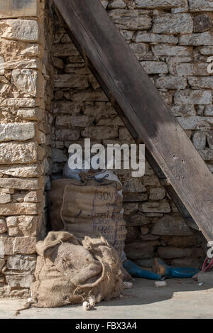 Rustic hessian sacks and rustic wall in the small, quite and charming village of Sangti, Arunachal Pradesh, INDIA. Stock Photo