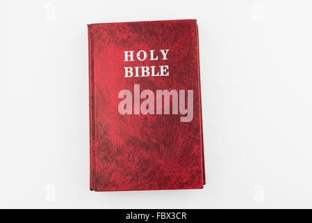 red holy bible book, top view, isolated background Stock Photo